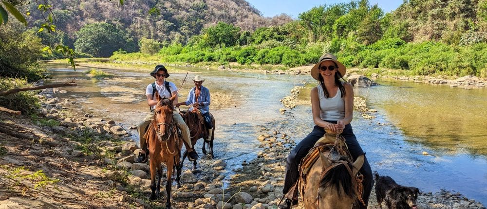 crossing river by horse
